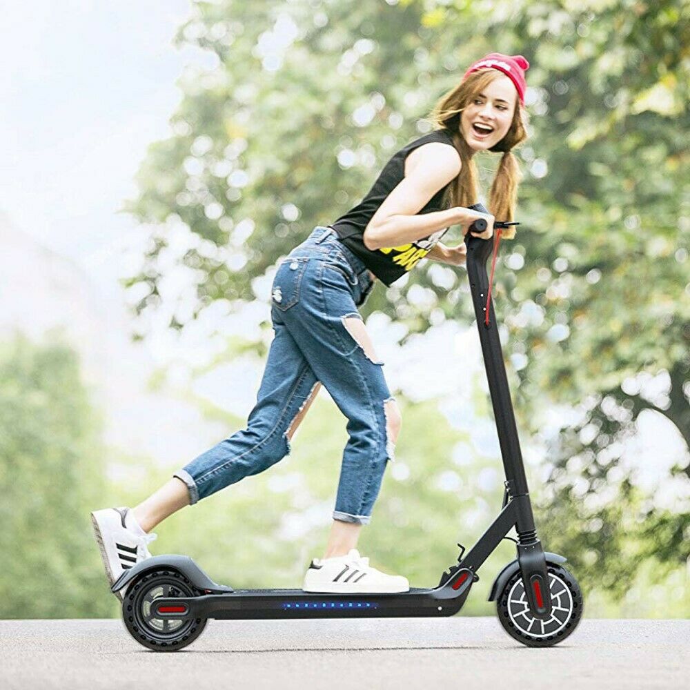 girl riding m5 electric scooter outside